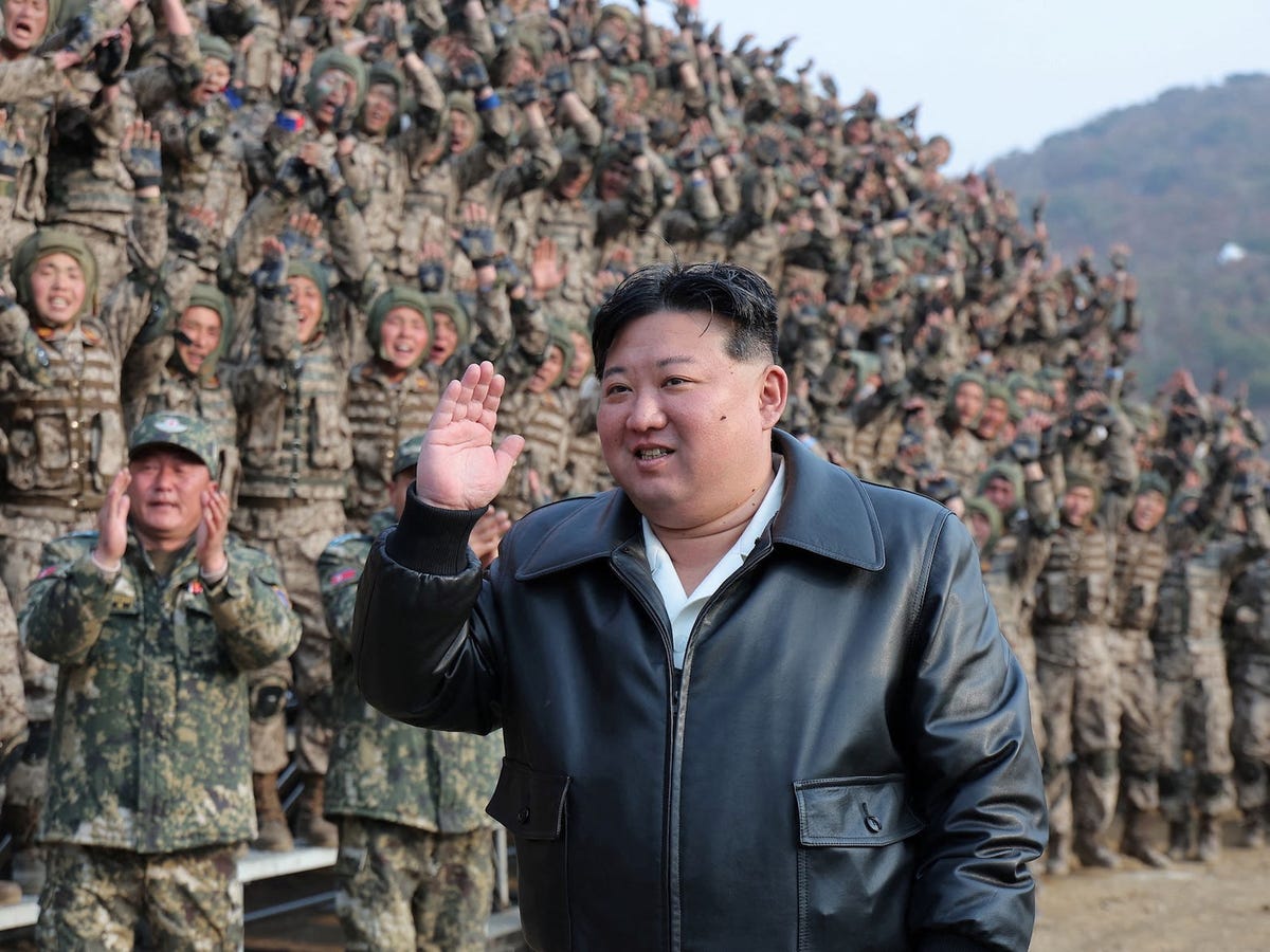 One of them looked visibly emotional as Kim held his head and hand while he sat in a wheelchair in a military uniform. Other images showed Kim consoling families of the deceased and kneeling before a portrait of a fallen soldier to pay his respects, placing what appeared to be medals and flowers beside images of the dead. The North Korean leader also mentioned the "pain of waiting for one hundred and twenty days in which he had never forgotten the beloved sons even for a moment". In September, Kim appeared alongside Chinese President Xi Jinping and Russian President Vladimir Putin at an elaborate military parade in Beijing. Kim did not respond to an offer from Donald Trump to meet during the US president's Asia trip in October.