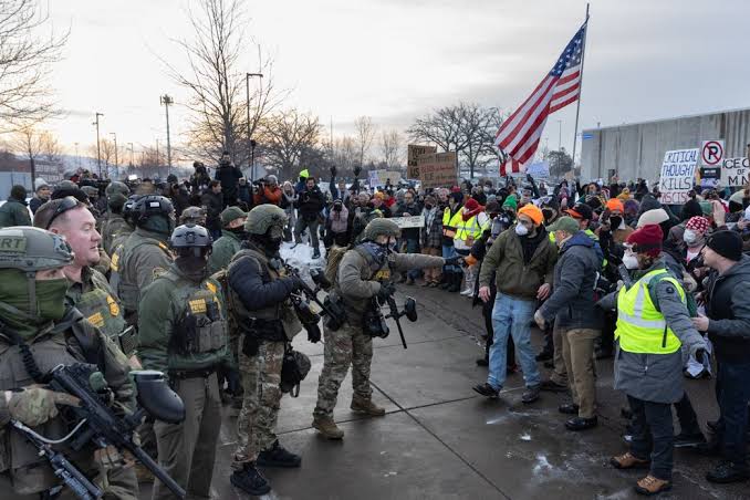 "NOW: Protesters barricading the roadway — federal agents currently unable to leave the scene following an ICE involved shooting" captures a tense, ongoing escalation in south Minneapolis on January 24, 2026.