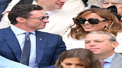 See trending Photos of Hugh Jackman and Kate Beckinsale flirting