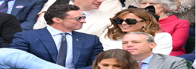 See trending Photos of Hugh Jackman and Kate Beckinsale flirting