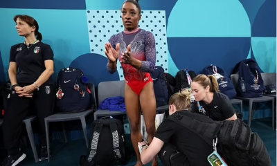 Simone Biles reveals the damage to her calf as she wears protective BOOT following painful end to Paris Olympics