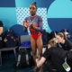 Simone Biles reveals the damage to her calf as she wears protective BOOT following painful end to Paris Olympics