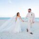 Travis Kelce weds Taylor swift at beach side while his brother Jason Kelce and his wife Kylie Kelce and Patrick Maohomes and Brittany Maohomes stand by...